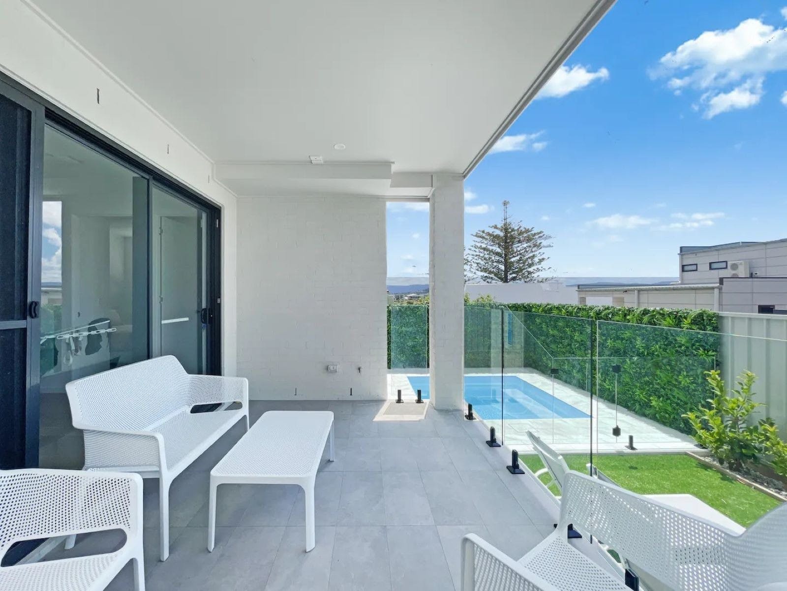 Entertaining area and pool at Beach Side Luxury at the Point