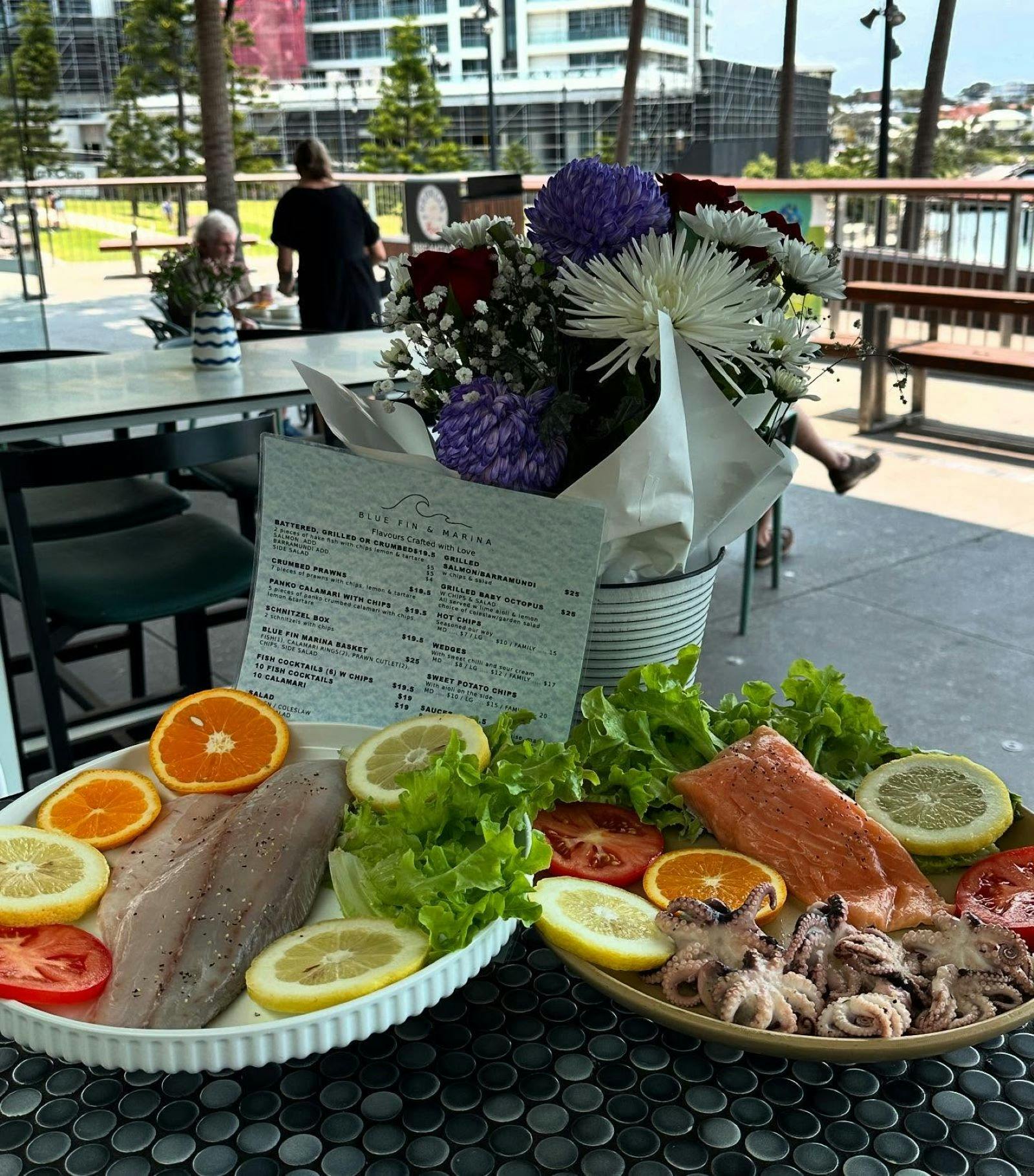Blue Fin & Marina dining overlooking the sparkling waters at the Marina