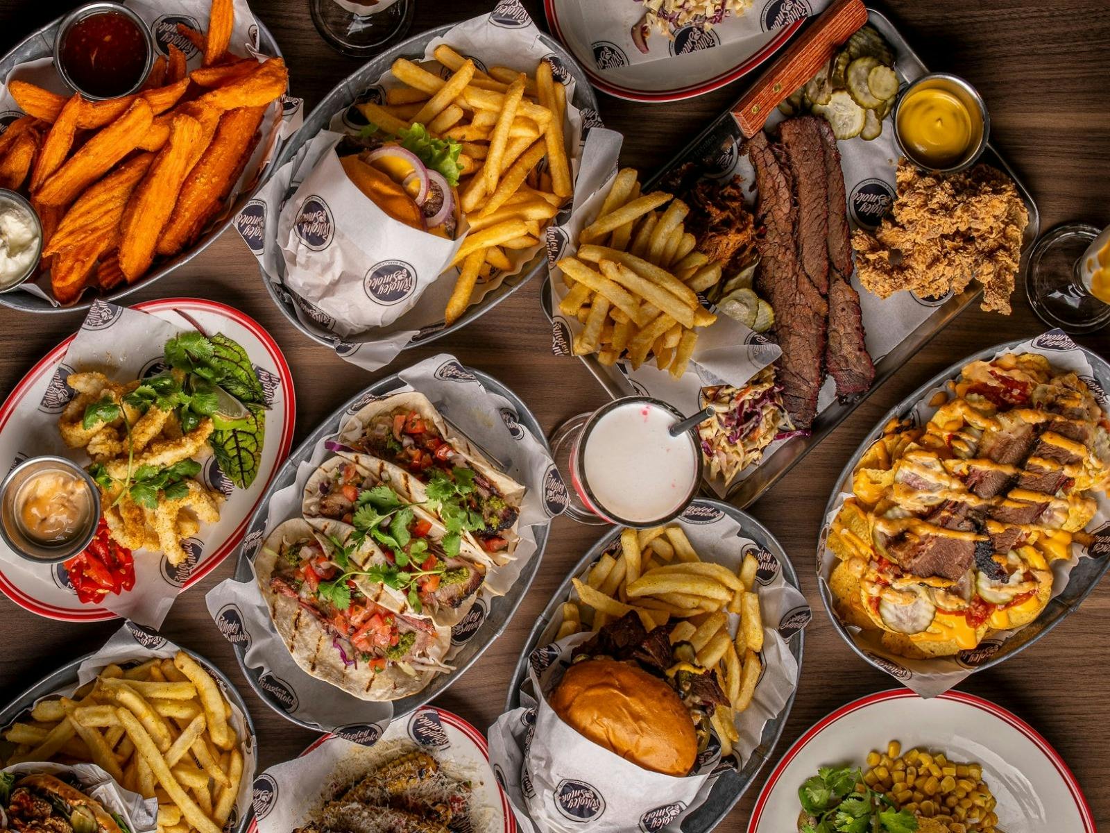 aerial shot of a spread of food from Wholey Smoke Bistro