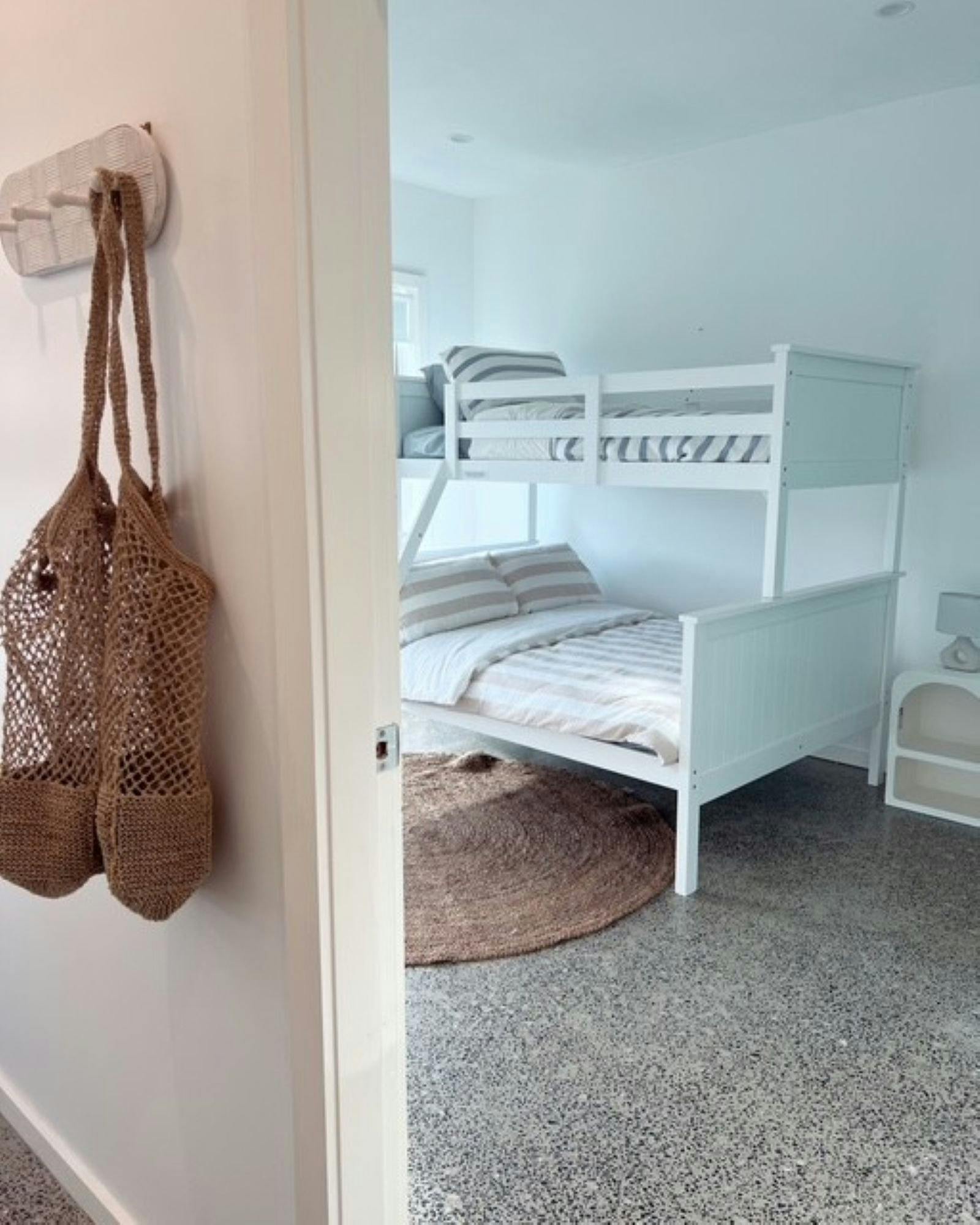 Triple bunk bed and soft furnishings