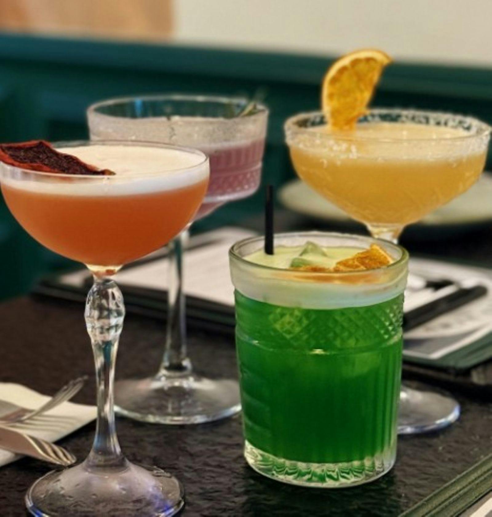 various types of cocktails and glasses