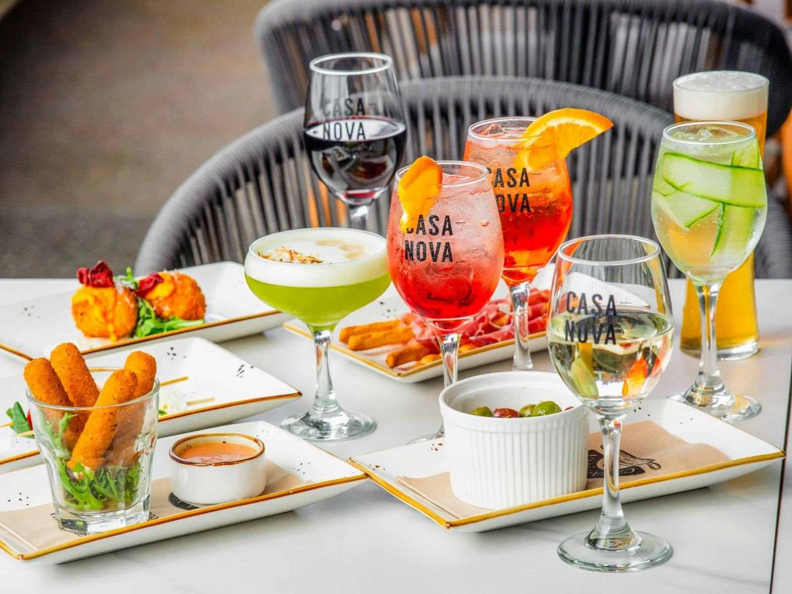 tapas and cocktails on table