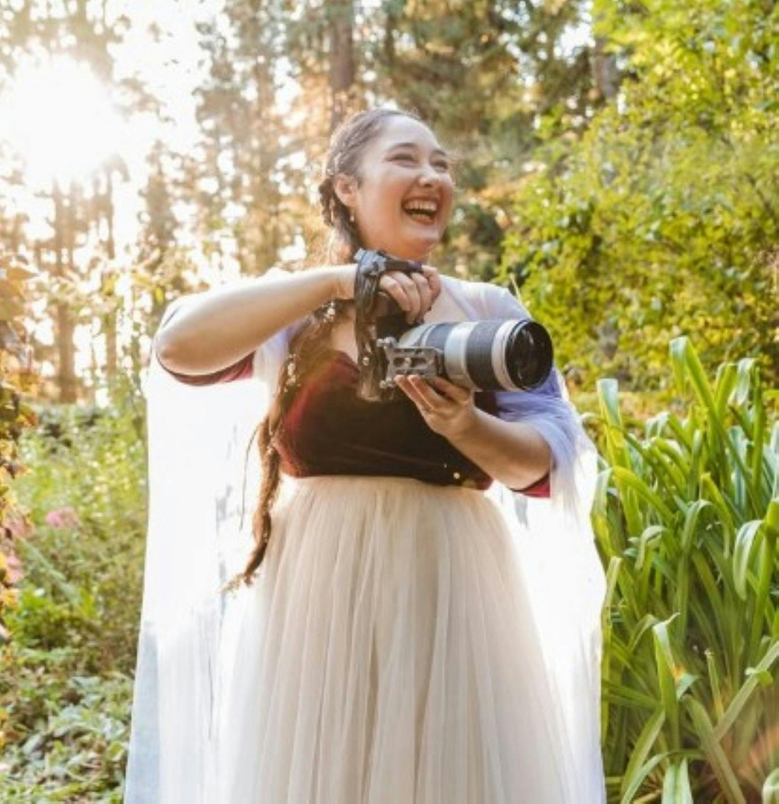 Chloe Marie holding camera