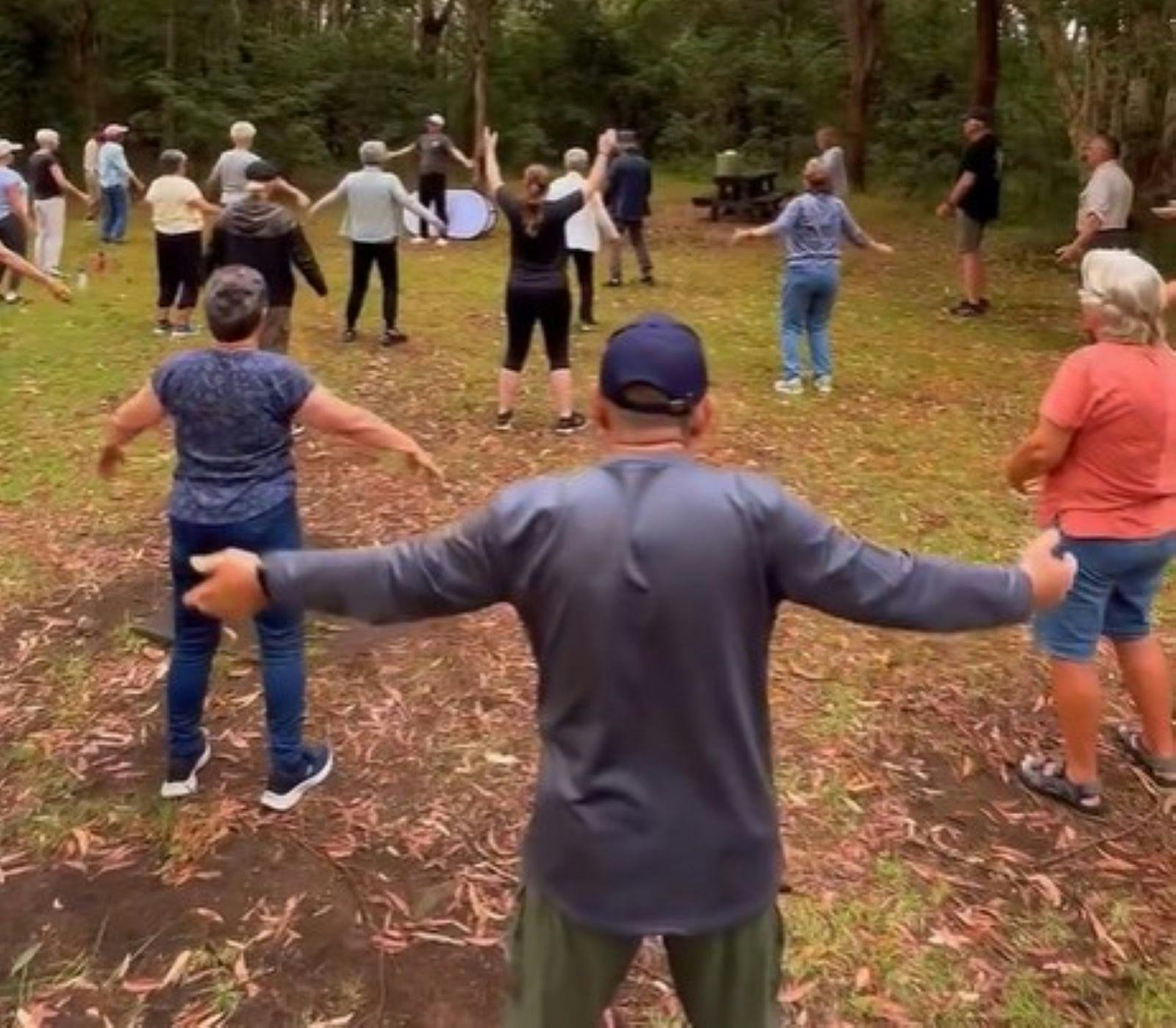 Mixed group of tai chi participants at Blackbutt Reserve