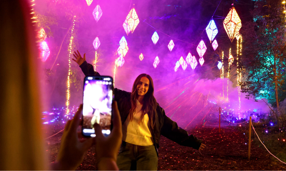 Girl getting her photo taken at The Enchanted Forest