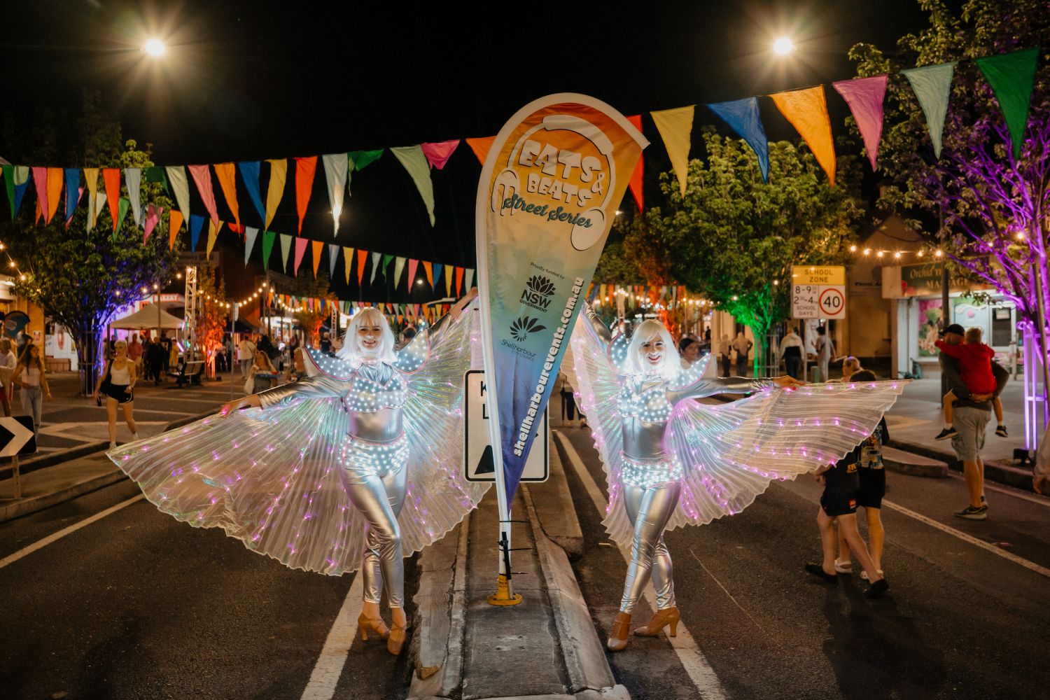 Street performers with fairy wings at Eats and Beats Albion Park