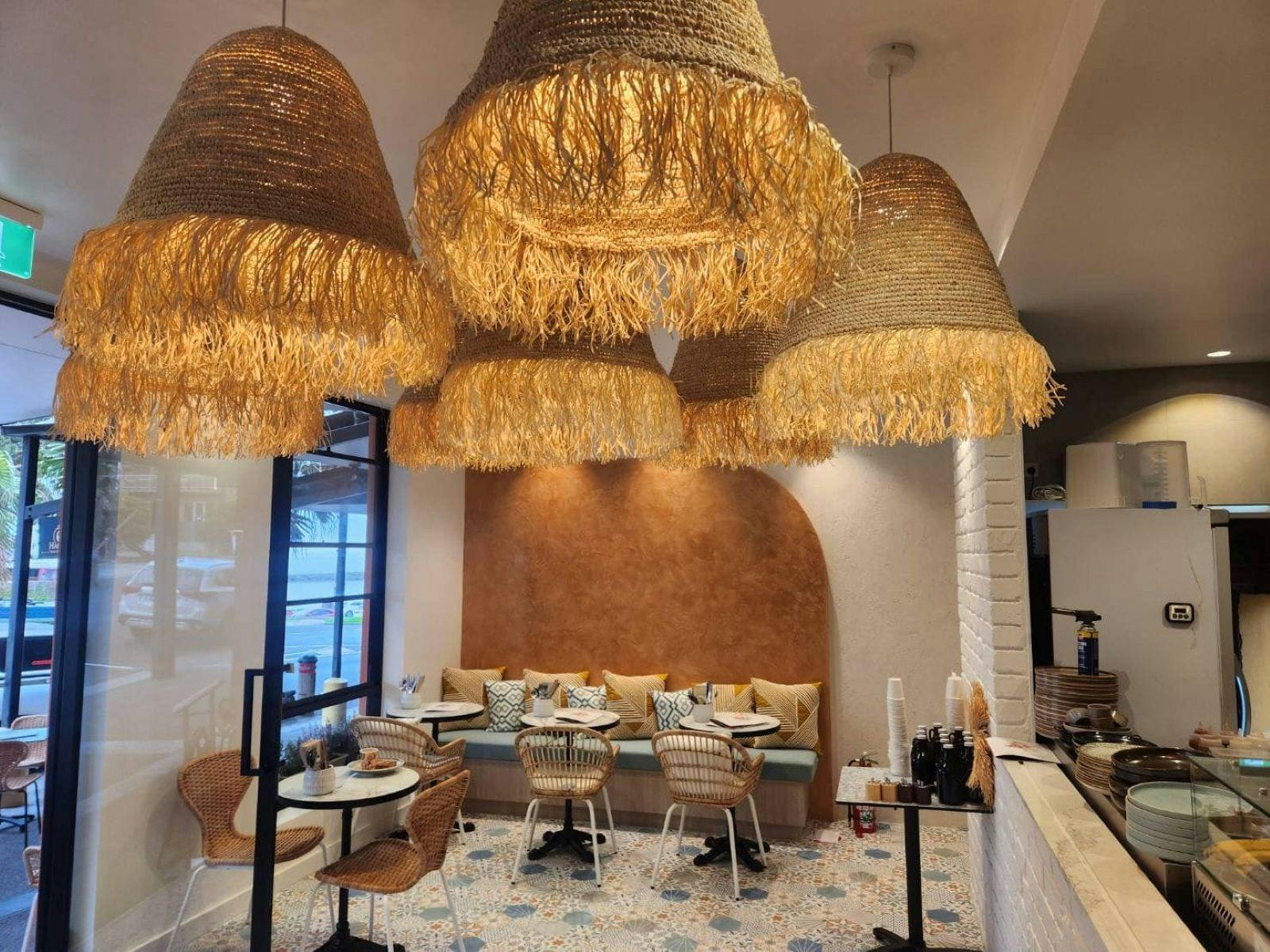 Inside De Village Cafe low lighting and comfortable furniture