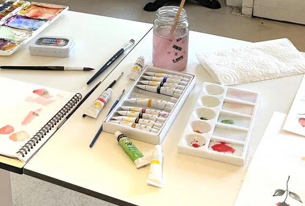Art supplies setup on a table