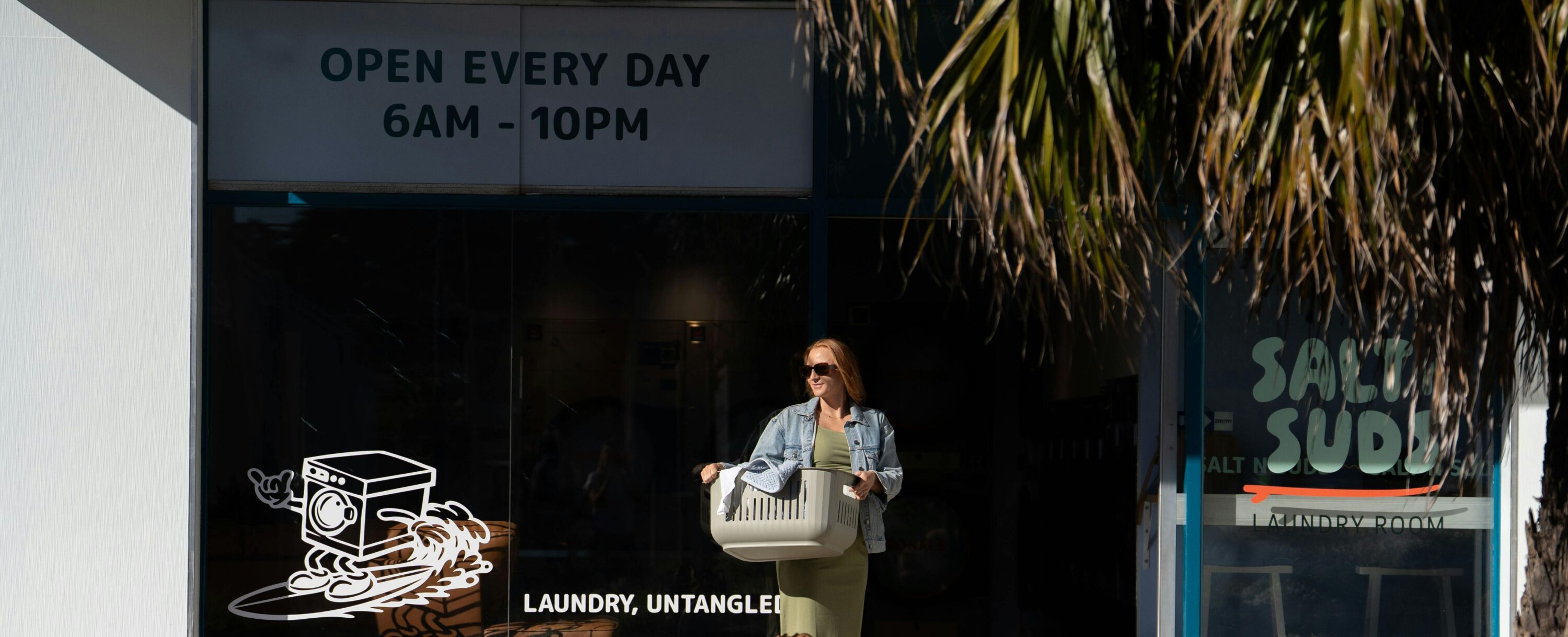 lady with a bag of washing walk outside